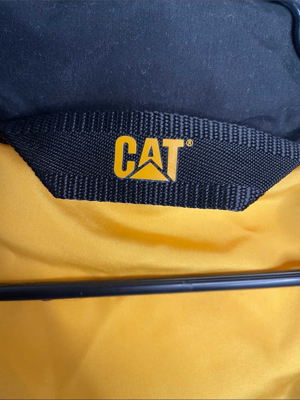 Caterpillar Black Puffer Vest with Yellow Accents - Picture 2 of 9